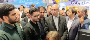 بازدید استاندار و جمعی از مدیران ارشد استان از غرفه دانشگاه ملی مهارت استان کرمانشاه 7